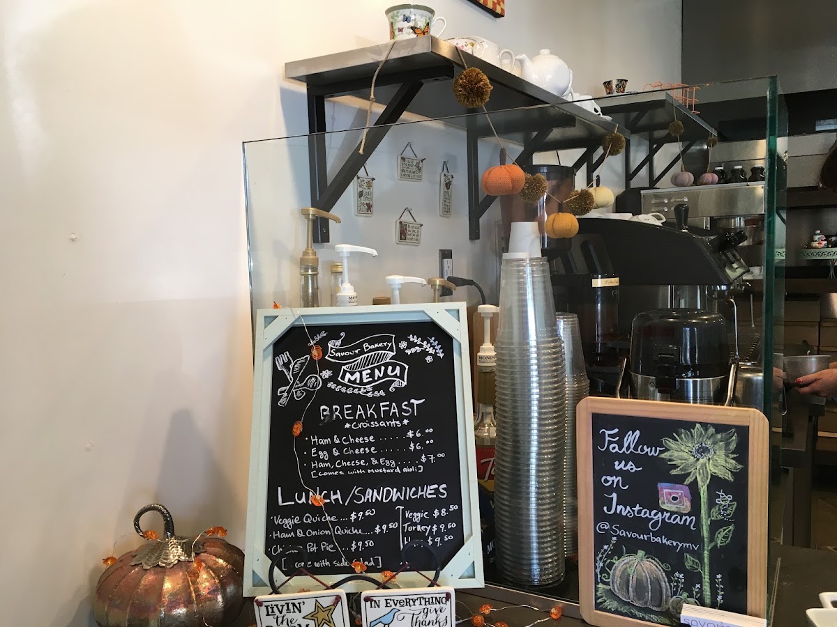 The handwritten chalkboard menu at the Savour Bakery counter